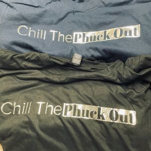 “Chill The Phuck Out” Black T with foil font lettering.